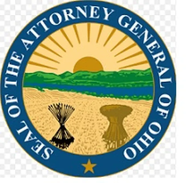Round circle logo with thick blue outline  and words Seal of the Attorney General of Ohio and inside a sun, hill, river, corn bushel