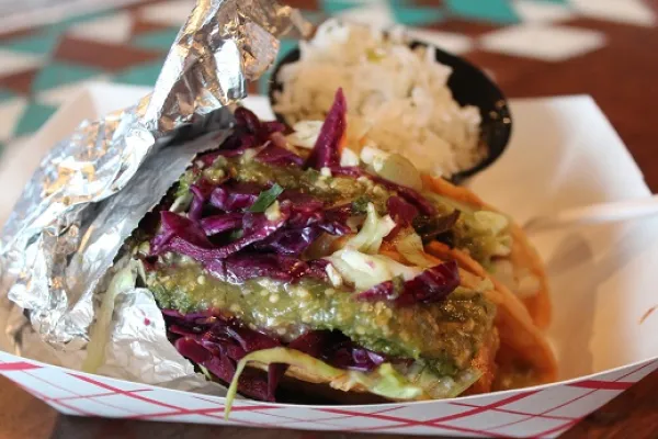 Vegan Tacos, Hominy Thai Tofu, taco with jicama cabbage slaw, red cabbage and salsa verde with a side of cilantro lime rice.