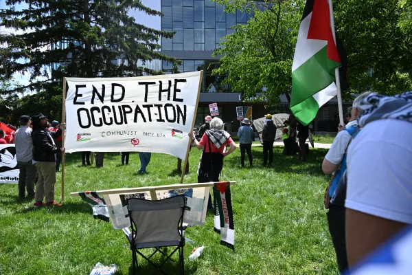 End the occupation banner