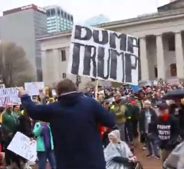 Dump Trump sign at protest at Statehouse