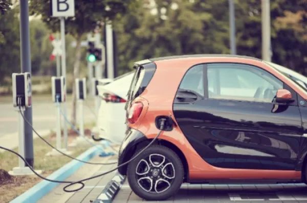 Electric car at a charging station