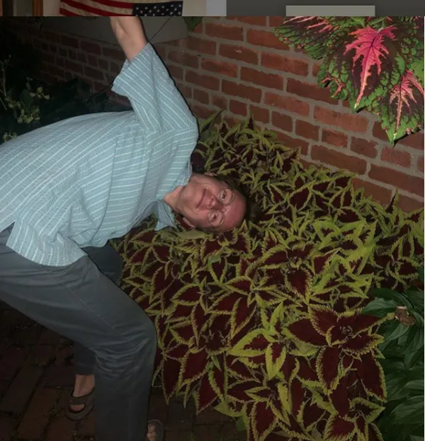 KIP - white guy outside almost laying down on the ground