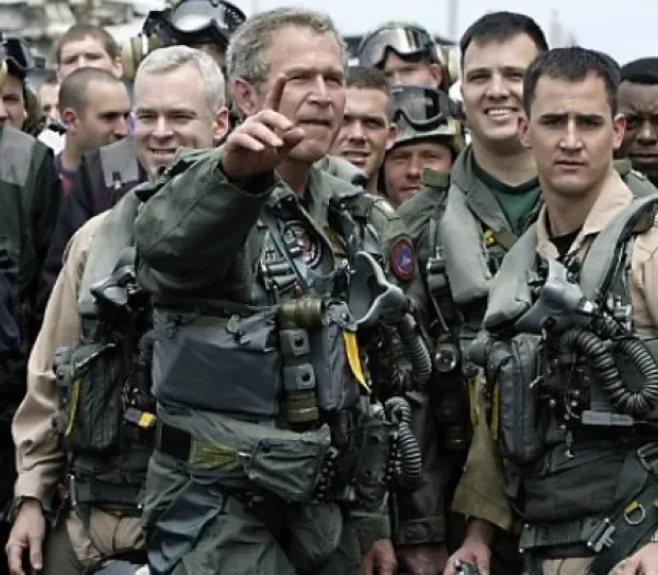 George W Bush with soldiers