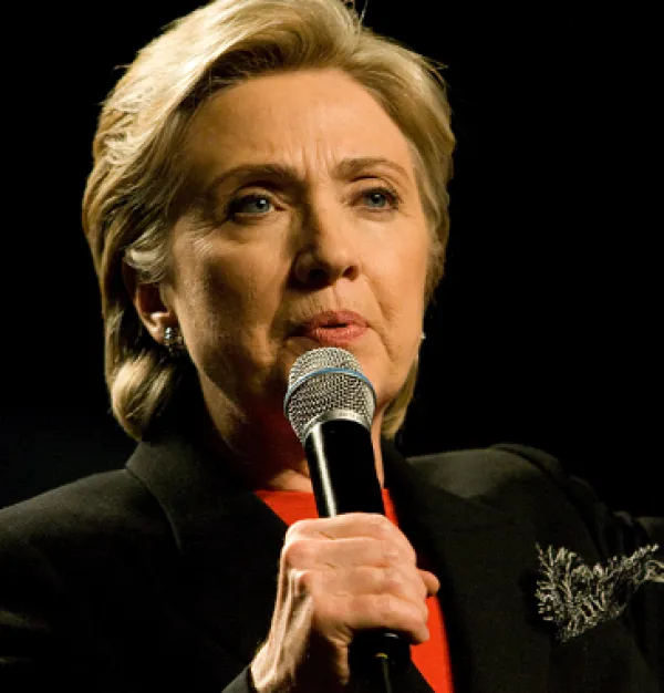 Hillary Clinton talking into a mic