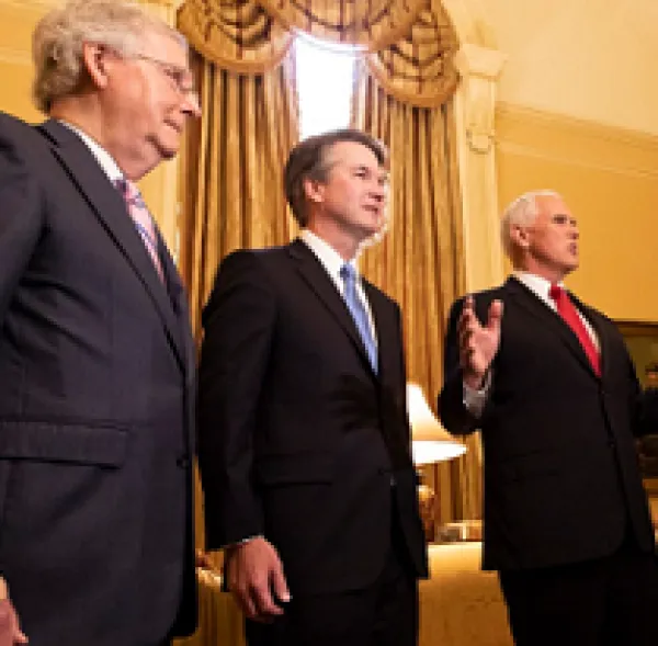 Three older white guys in a room with fancy curtains