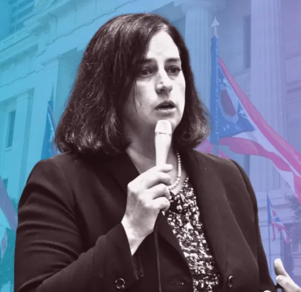 White woman with a mic