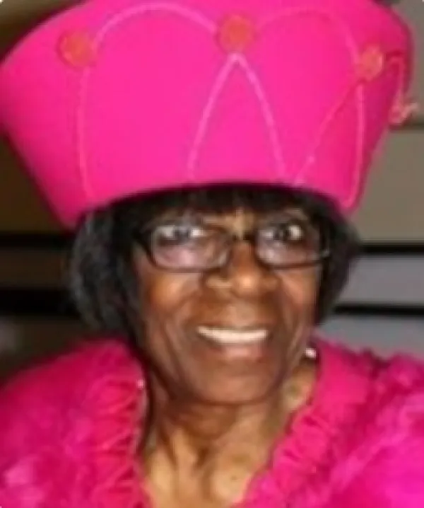 Margie Daffey in a bright pink outfit