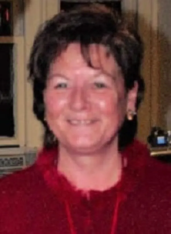 Smiling white woman with short brown hair