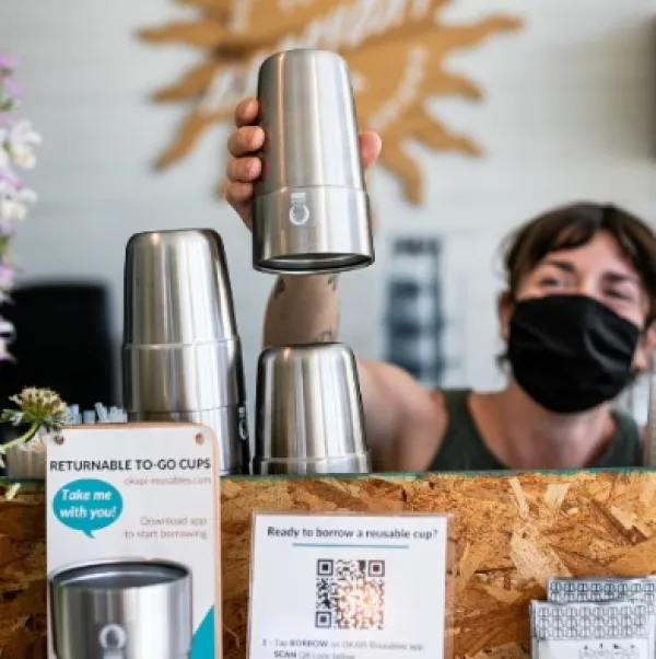 Metal coffee cups at coffeeshop