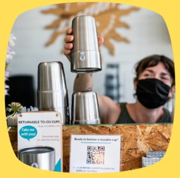 Man with cup at coffee shop