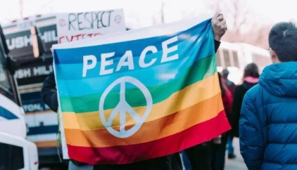 Peace sign on rainbow flag
