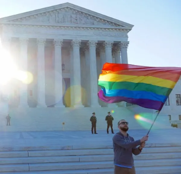 Rainbow flag waved in front of government building