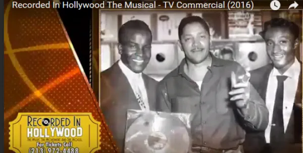 Black and white photo of three guys in recording studio