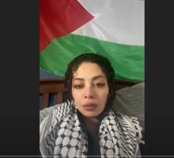 Palestinian woman and flag