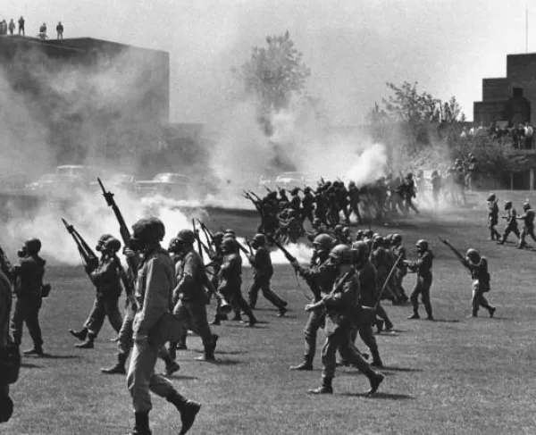 National Guard advancing with weapons drawn