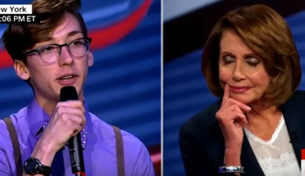 Trevor Hills talking into a mic on one side and Nancy Pelosi looking down on the other side