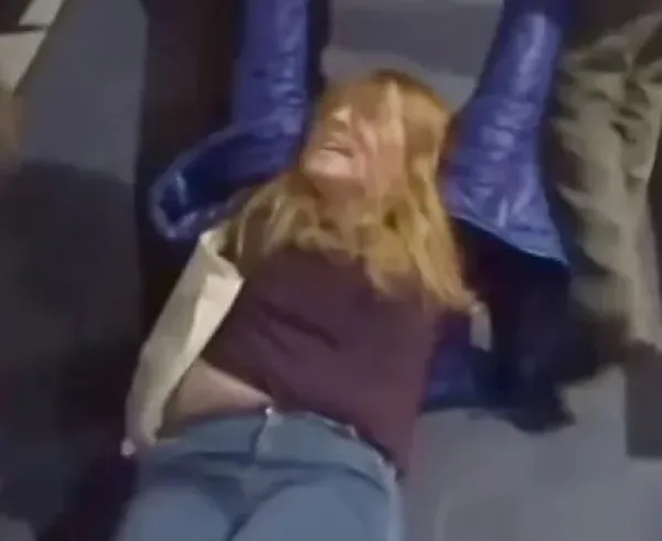 Woman being dragged