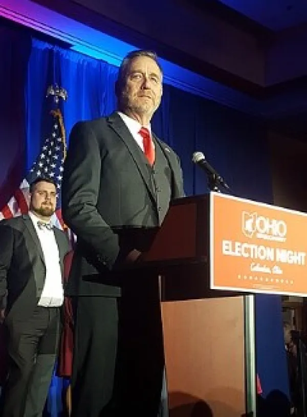 Attorney General of OH Yost at a podium