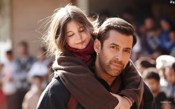 Man carrying a little girl on his back 