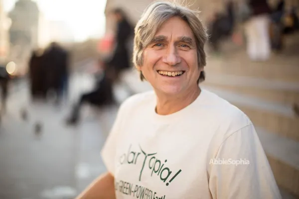 Harvey smiling with Solartopia shirt on