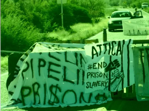 Banner about stopping prison slavery